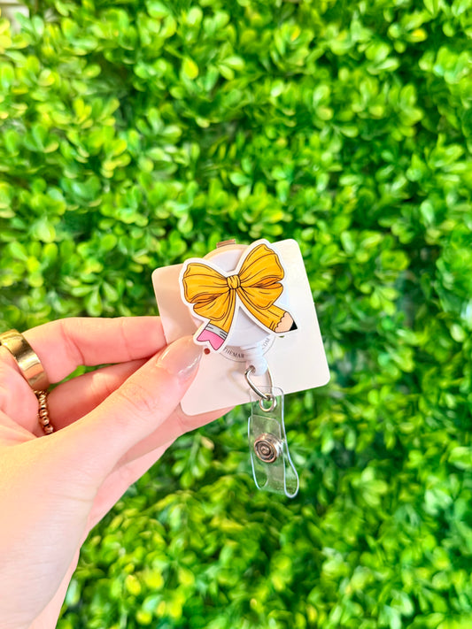 Pencil Bow Badge Reel