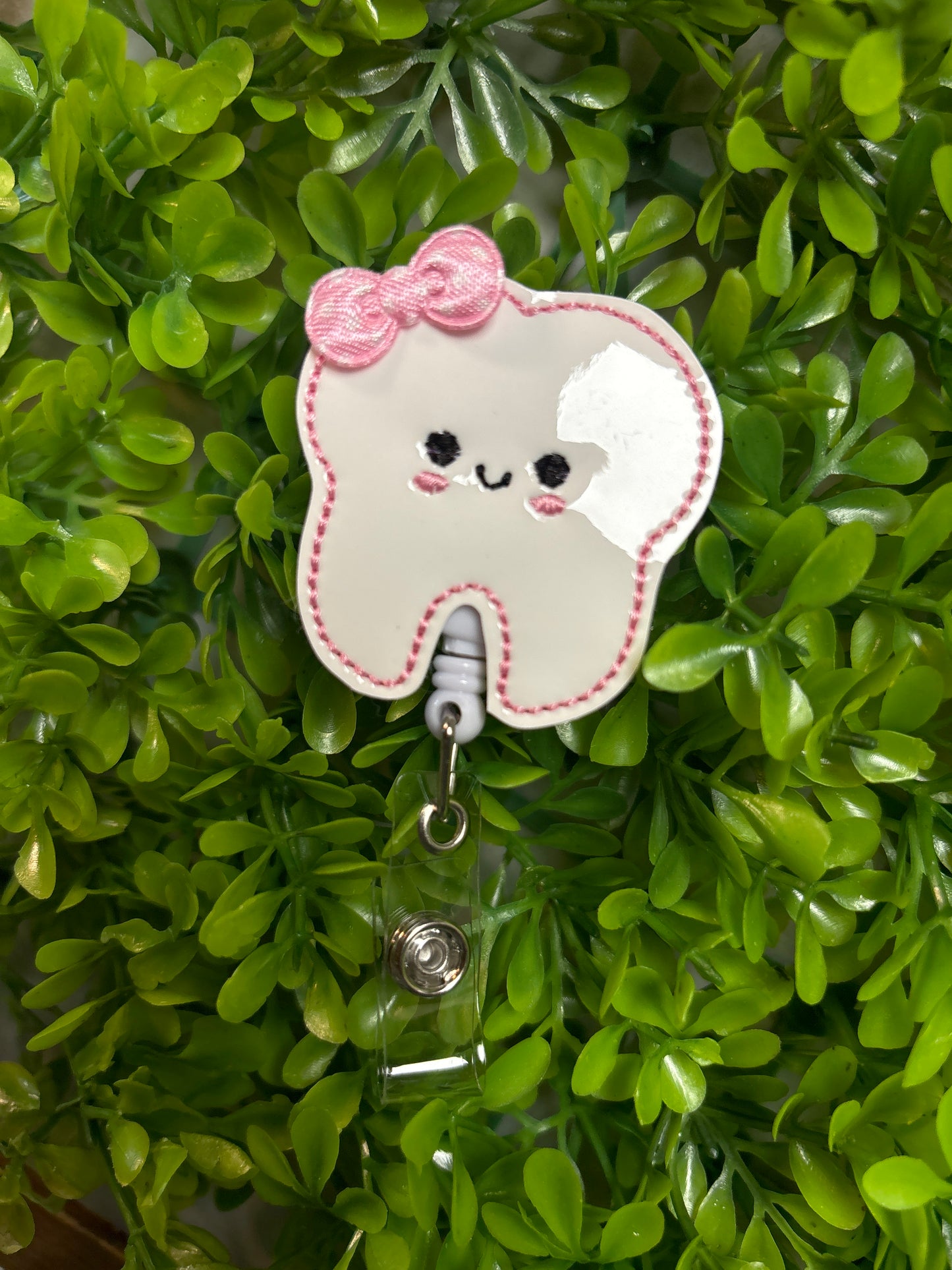 Tooth with Pink Bow Badge Reel