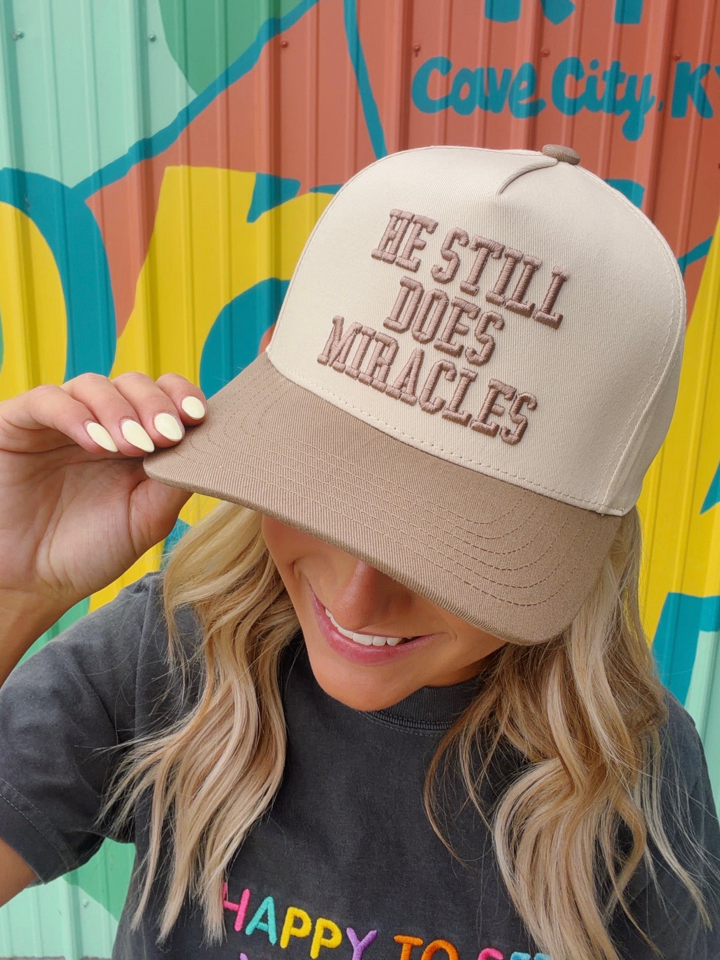 He Still Does Miracles Tan Trucker Hat